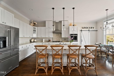 This stunning ranch-style home with a fully finished basement on Chapel Ridge Golf Club in North Carolina - for sale on GolfHomes.com, golf home, golf lot