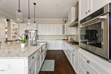 This stunning ranch-style home with a fully finished basement on Chapel Ridge Golf Club in North Carolina - for sale on GolfHomes.com, golf home, golf lot