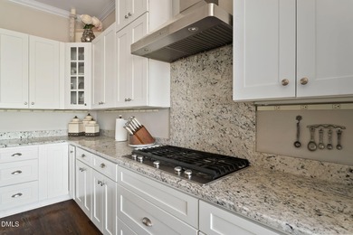 This stunning ranch-style home with a fully finished basement on Chapel Ridge Golf Club in North Carolina - for sale on GolfHomes.com, golf home, golf lot