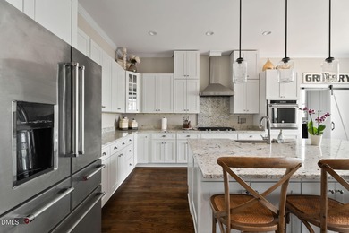 This stunning ranch-style home with a fully finished basement on Chapel Ridge Golf Club in North Carolina - for sale on GolfHomes.com, golf home, golf lot