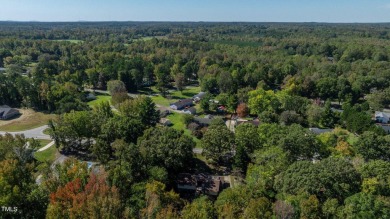 Just in time for the holidays! Gather friends and family to on Forest Oaks Country Club in North Carolina - for sale on GolfHomes.com, golf home, golf lot