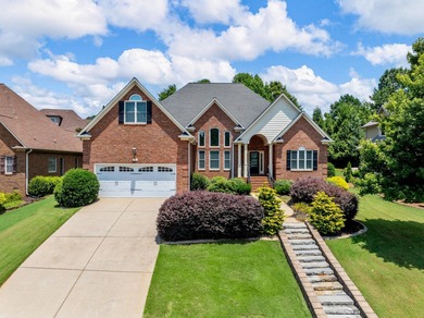 Welcome to a home that blends thoughtful design with timeless on Woodfin Ridge Golf Club in South Carolina - for sale on GolfHomes.com, golf home, golf lot