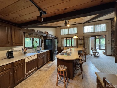 High-Efficiency Solar Home with Golf Course Frontage on 13+/- on Gogebic Country Club in Michigan - for sale on GolfHomes.com, golf home, golf lot