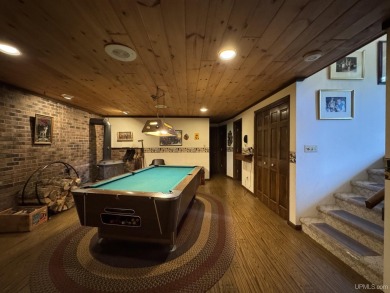 High-Efficiency Solar Home with Golf Course Frontage on 13+/- on Gogebic Country Club in Michigan - for sale on GolfHomes.com, golf home, golf lot