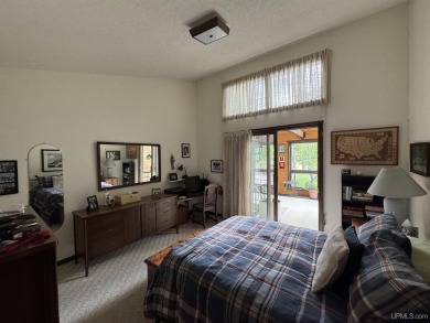 High-Efficiency Solar Home with Golf Course Frontage on 13+/- on Gogebic Country Club in Michigan - for sale on GolfHomes.com, golf home, golf lot