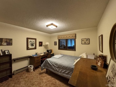 High-Efficiency Solar Home with Golf Course Frontage on 13+/- on Gogebic Country Club in Michigan - for sale on GolfHomes.com, golf home, golf lot