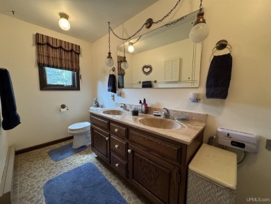 High-Efficiency Solar Home with Golf Course Frontage on 13+/- on Gogebic Country Club in Michigan - for sale on GolfHomes.com, golf home, golf lot