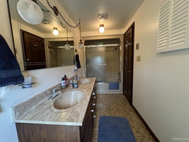 High-Efficiency Solar Home with Golf Course Frontage on 13+/- on Gogebic Country Club in Michigan - for sale on GolfHomes.com, golf home, golf lot