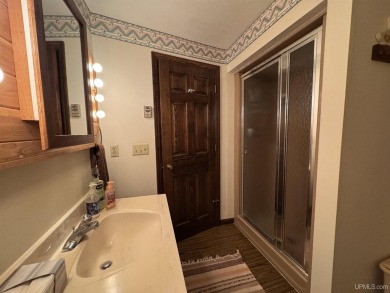 High-Efficiency Solar Home with Golf Course Frontage on 13+/- on Gogebic Country Club in Michigan - for sale on GolfHomes.com, golf home, golf lot