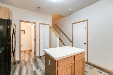 This immaculate townhome in the quiet and well kept Willow Glen on Buffalo Heights Golf Course in Minnesota - for sale on GolfHomes.com, golf home, golf lot