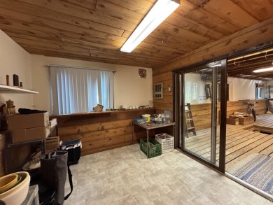 High-Efficiency Solar Home with Golf Course Frontage on 13+/- on Gogebic Country Club in Michigan - for sale on GolfHomes.com, golf home, golf lot