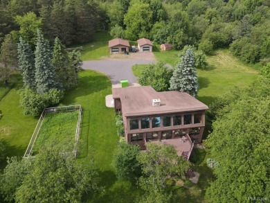 High-Efficiency Solar Home with Golf Course Frontage on 13+/- on Gogebic Country Club in Michigan - for sale on GolfHomes.com, golf home, golf lot