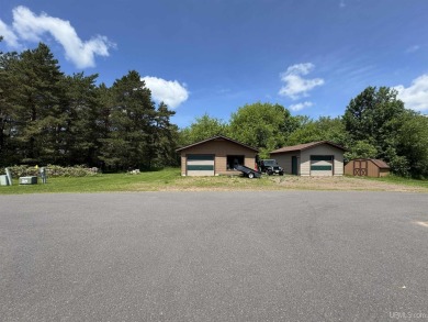 High-Efficiency Solar Home with Golf Course Frontage on 13+/- on Gogebic Country Club in Michigan - for sale on GolfHomes.com, golf home, golf lot
