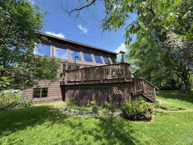 High-Efficiency Solar Home with Golf Course Frontage on 13+/- on Gogebic Country Club in Michigan - for sale on GolfHomes.com, golf home, golf lot