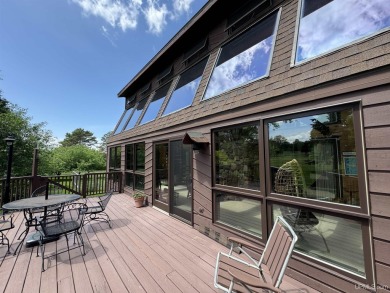 High-Efficiency Solar Home with Golf Course Frontage on 13+/- on Gogebic Country Club in Michigan - for sale on GolfHomes.com, golf home, golf lot