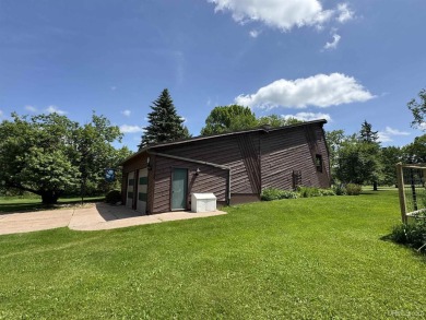 High-Efficiency Solar Home with Golf Course Frontage on 13+/- on Gogebic Country Club in Michigan - for sale on GolfHomes.com, golf home, golf lot