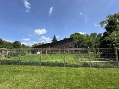 High-Efficiency Solar Home with Golf Course Frontage on 13+/- on Gogebic Country Club in Michigan - for sale on GolfHomes.com, golf home, golf lot