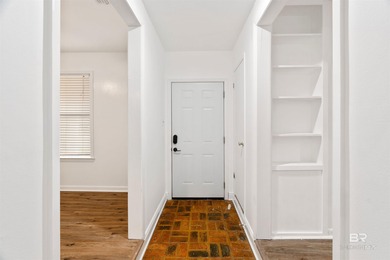 This charming 3 bed/2 bath Lake Forest cottage on a spacious on Lake Forest Yacht and Country Club in Alabama - for sale on GolfHomes.com, golf home, golf lot