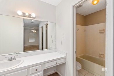 This charming 3 bed/2 bath Lake Forest cottage on a spacious on Lake Forest Yacht and Country Club in Alabama - for sale on GolfHomes.com, golf home, golf lot