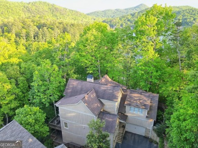 Nestled in the coveted Waterfall at Lake Burton community, this on Waterfall Country Club in Georgia - for sale on GolfHomes.com, golf home, golf lot