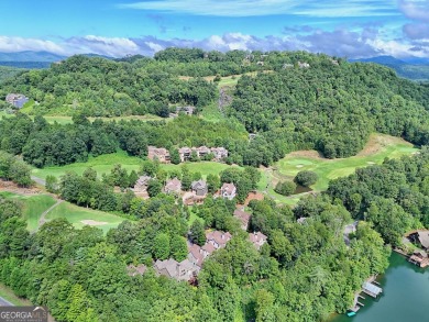Nestled in the coveted Waterfall at Lake Burton community, this on Waterfall Country Club in Georgia - for sale on GolfHomes.com, golf home, golf lot