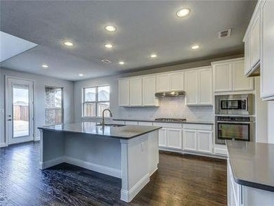 This property is in the sought-after The Tribute community in on The Tribute At the Colony in Texas - for sale on GolfHomes.com, golf home, golf lot