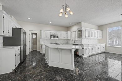 Welcome to this beautifully maintained 4-bedroom, 3.1-bath home on Falcon Valley Golf Course in Kansas - for sale on GolfHomes.com, golf home, golf lot