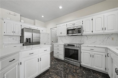 Welcome to this beautifully maintained 4-bedroom, 3.1-bath home on Falcon Valley Golf Course in Kansas - for sale on GolfHomes.com, golf home, golf lot