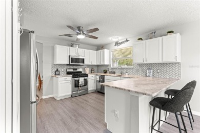 BOND PAID!! NO CARPET!! ROOF 2017!!! Welcome to this charming on El Santiago Executive Golf Course in Florida - for sale on GolfHomes.com, golf home, golf lot