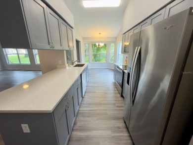 Welcome to this beautifully updated 2-bedroom, 2-bath villa on Timber Greens Country Club in Florida - for sale on GolfHomes.com, golf home, golf lot