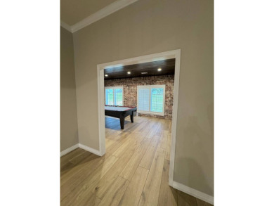 Stunning custom-built 5 bed, 3.5 bath home located right next to on Wolf Ridge Golf Course in Oklahoma - for sale on GolfHomes.com, golf home, golf lot