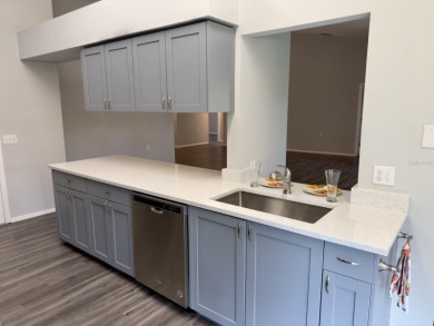 Welcome to this beautifully updated 2-bedroom, 2-bath villa on Timber Greens Country Club in Florida - for sale on GolfHomes.com, golf home, golf lot