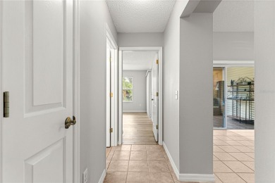 BOND PAID!! NO CARPET!! ROOF 2017!!! Welcome to this charming on El Santiago Executive Golf Course in Florida - for sale on GolfHomes.com, golf home, golf lot