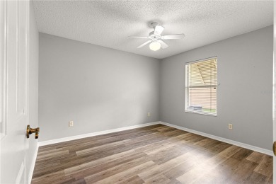 BOND PAID!! NO CARPET!! ROOF 2017!!! Welcome to this charming on El Santiago Executive Golf Course in Florida - for sale on GolfHomes.com, golf home, golf lot