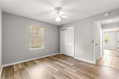 BOND PAID!! NO CARPET!! ROOF 2017!!! Welcome to this charming on El Santiago Executive Golf Course in Florida - for sale on GolfHomes.com, golf home, golf lot