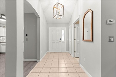 BOND PAID!! NO CARPET!! ROOF 2017!!! Welcome to this charming on El Santiago Executive Golf Course in Florida - for sale on GolfHomes.com, golf home, golf lot
