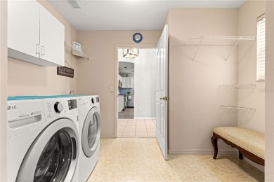 BOND PAID!! NO CARPET!! ROOF 2017!!! Welcome to this charming on El Santiago Executive Golf Course in Florida - for sale on GolfHomes.com, golf home, golf lot