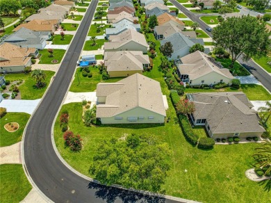 BOND PAID!! NO CARPET!! ROOF 2017!!! Welcome to this charming on El Santiago Executive Golf Course in Florida - for sale on GolfHomes.com, golf home, golf lot