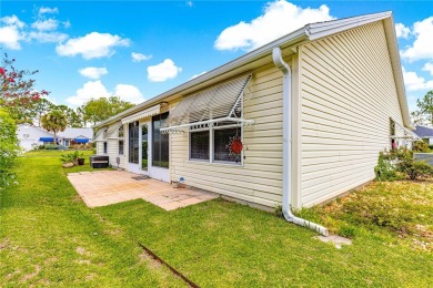 BOND PAID!! NO CARPET!! ROOF 2017!!! Welcome to this charming on El Santiago Executive Golf Course in Florida - for sale on GolfHomes.com, golf home, golf lot