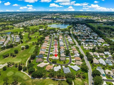 BOND PAID!! NO CARPET!! ROOF 2017!!! Welcome to this charming on El Santiago Executive Golf Course in Florida - for sale on GolfHomes.com, golf home, golf lot
