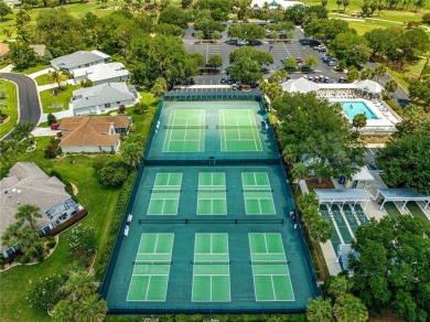 BOND PAID!! NO CARPET!! ROOF 2017!!! Welcome to this charming on El Santiago Executive Golf Course in Florida - for sale on GolfHomes.com, golf home, golf lot