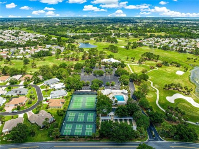 BOND PAID!! NO CARPET!! ROOF 2017!!! Welcome to this charming on El Santiago Executive Golf Course in Florida - for sale on GolfHomes.com, golf home, golf lot
