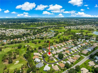 BOND PAID!! NO CARPET!! ROOF 2017!!! Welcome to this charming on El Santiago Executive Golf Course in Florida - for sale on GolfHomes.com, golf home, golf lot