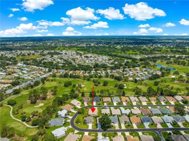 BOND PAID!! NO CARPET!! ROOF 2017!!! Welcome to this charming on El Santiago Executive Golf Course in Florida - for sale on GolfHomes.com, golf home, golf lot