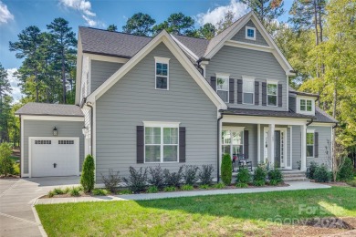 This breathtaking 5-bedroom, 4.5-bathroom luxury home combines on Olde Sycamore Golf Plantation in North Carolina - for sale on GolfHomes.com, golf home, golf lot