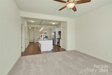 This exquisite, move-in-ready townhome in Statesville's esteemed on Fox Den Country Club in North Carolina - for sale on GolfHomes.com, golf home, golf lot