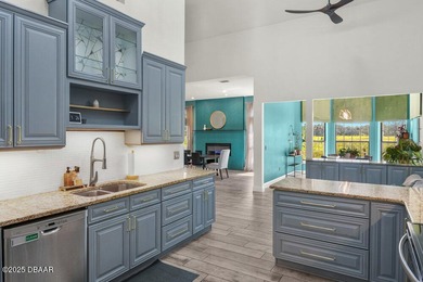 FULLY FURNISHED 5 bedroom 4 bathroom luxurious pool home sits in on Spruce Creek Golf Club in Florida - for sale on GolfHomes.com, golf home, golf lot