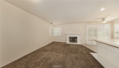 This is a home located within the desirable community of Sun on Sun Lakes Country Club in California - for sale on GolfHomes.com, golf home, golf lot