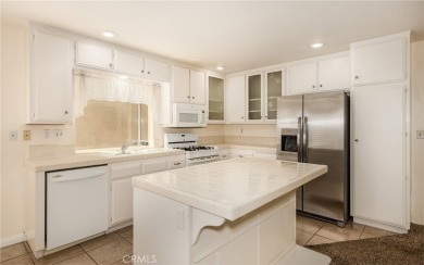 This is a home located within the desirable community of Sun on Sun Lakes Country Club in California - for sale on GolfHomes.com, golf home, golf lot