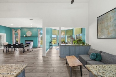 FULLY FURNISHED 5 bedroom 4 bathroom luxurious pool home sits in on Spruce Creek Golf Club in Florida - for sale on GolfHomes.com, golf home, golf lot